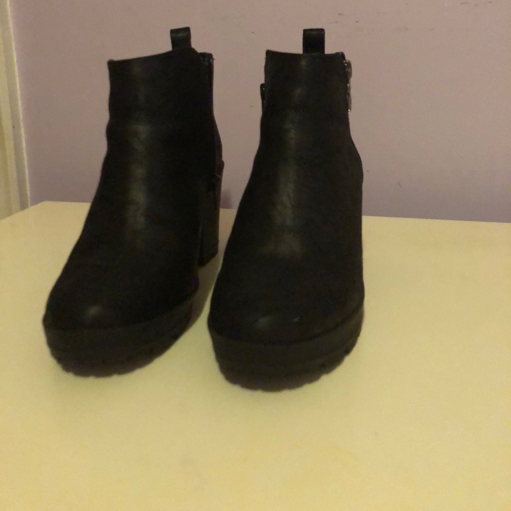 Black heel boots.